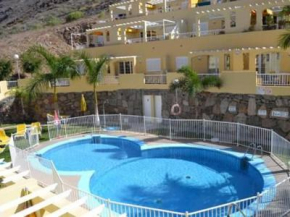 Гостиница Apartamentos Los Mangueros  Ла Плайа Дэ Моган